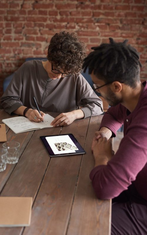 man-wearing-purple-long-sleeved-shirt-looking-at-the-ipad-3184326.jpg